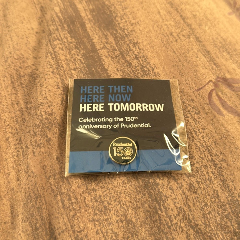 Lapel pin with Prudential logo. New.